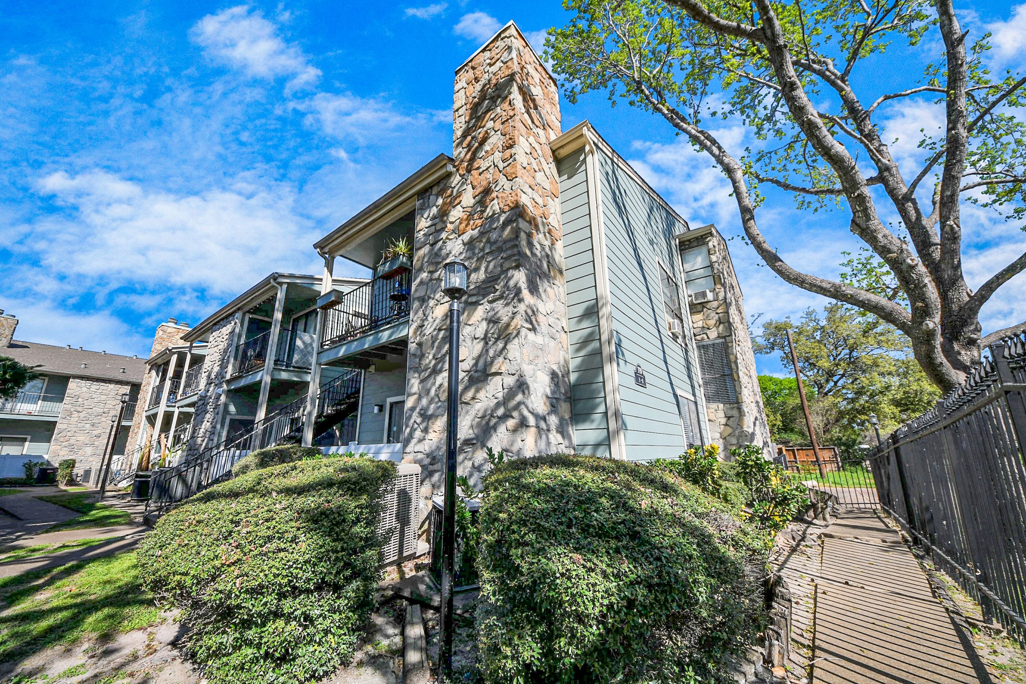 3750 Tanglewilde Street, Unit A7 Houston, TX 77063 - Photo 3 of 41 a view of a multi story building