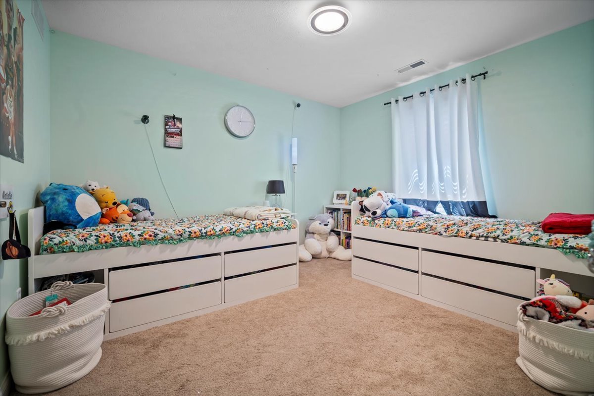 2321 Corrigan Way Normal, IL 61761 - Photo 18 of 33 a bedroom with a bed and a window