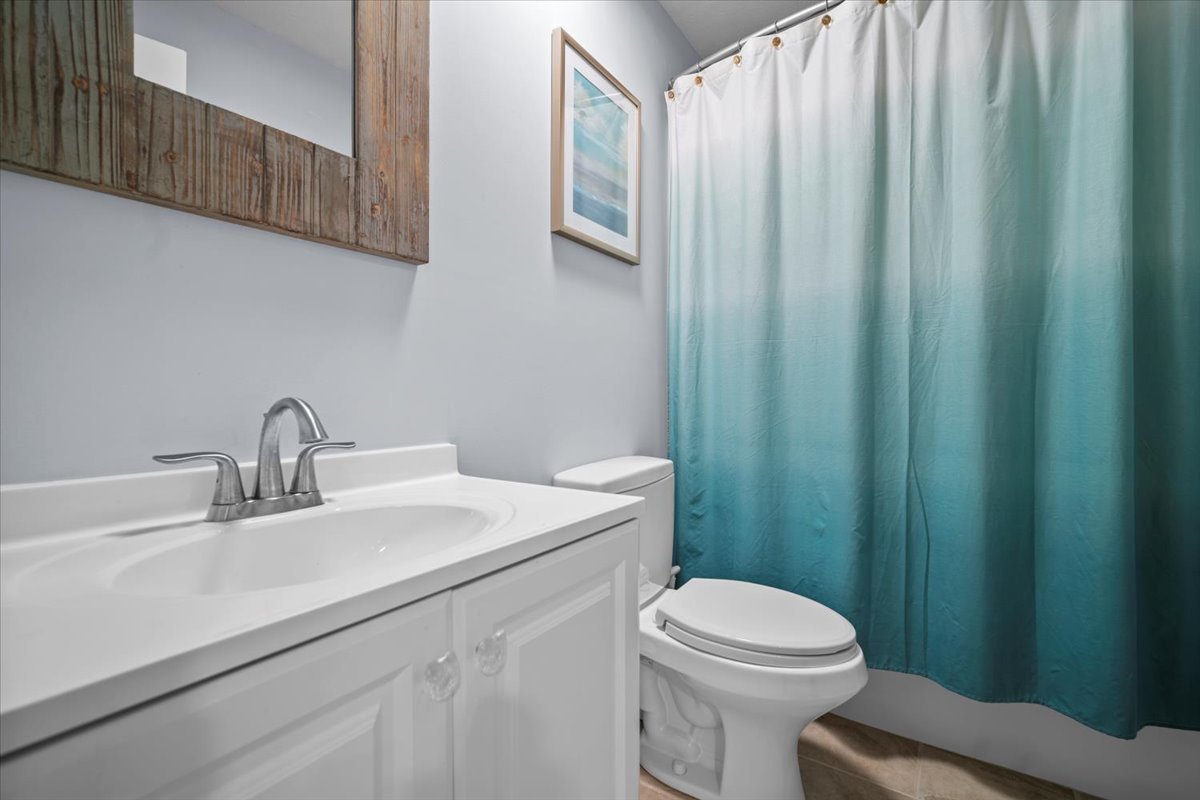 2321 Corrigan Way Normal, IL 61761 - Photo 26 of 33 a bathroom with a sink a toilet and shower