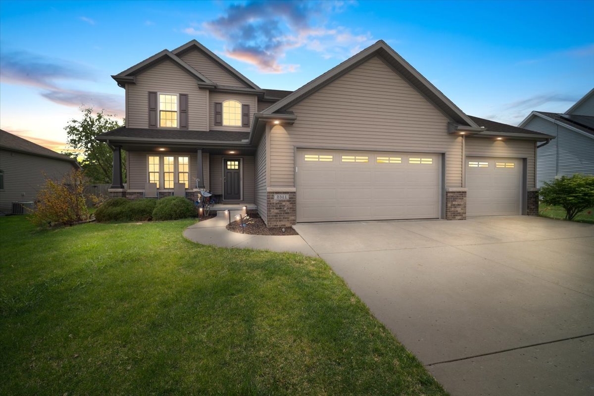 2321 Corrigan Way Normal, IL 61761 - Photo 33 of 33 a front view of a house with a yard and garage