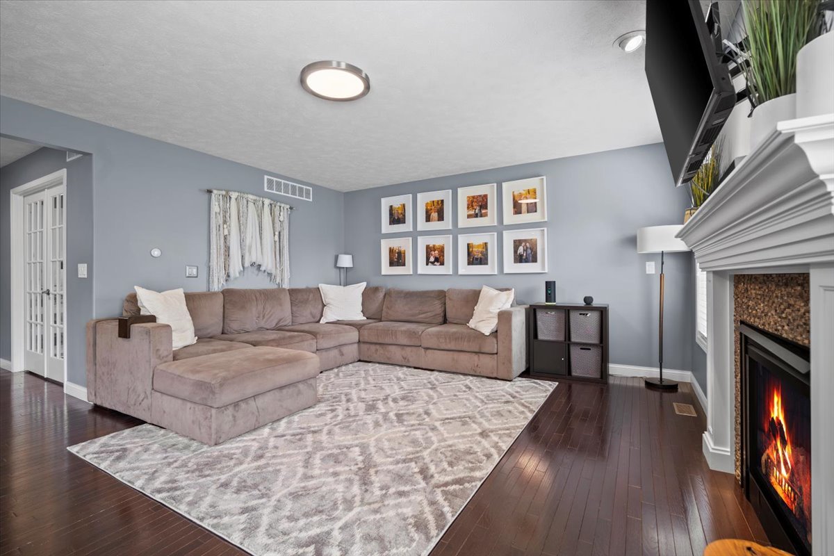 2321 Corrigan Way Normal, IL 61761 - Photo 6 of 33 a living room with furniture and a fireplace