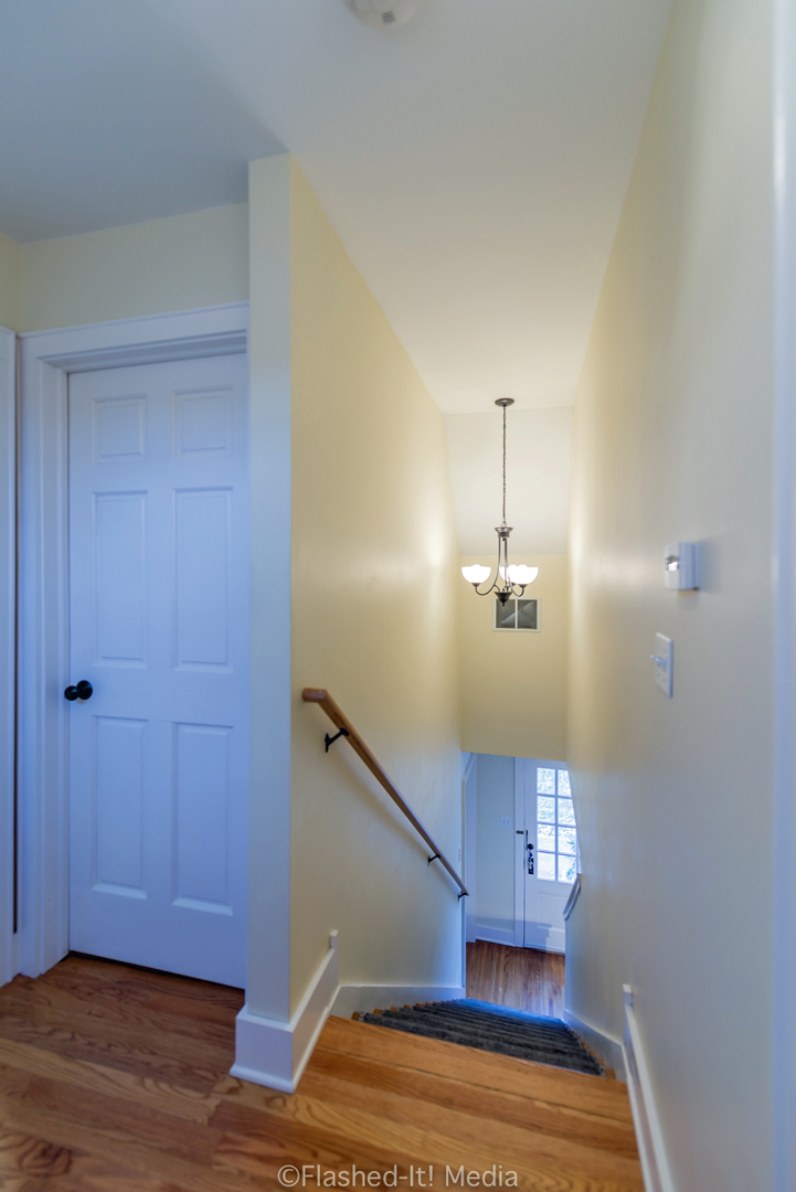 1727 Riverside Avenue St. Charles, IL 60174 - Photo 22 of 50 a view of entryway and hall with wooden floor