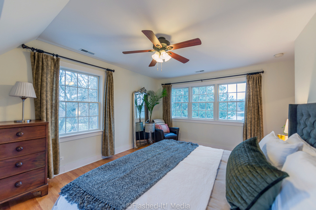 1727 Riverside Avenue St. Charles, IL 60174 - Photo 24 of 50 a bedroom with a bed dresser and a window