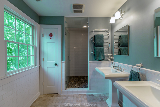 1727 Riverside Avenue St. Charles, IL 60174 - Photo 26 of 50 a bathroom with a double vanity sink mirror and shower