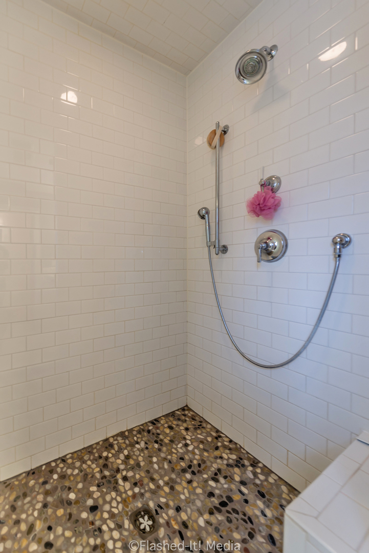 1727 Riverside Avenue St. Charles, IL 60174 - Photo 27 of 50 a bathroom with a sink and a mirror