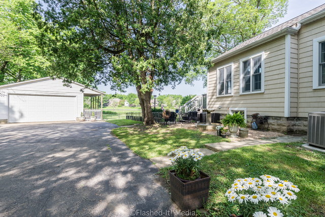 1727 Riverside Avenue St. Charles, IL 60174 - Photo 33 of 50 a view of a house with backyard and sitting area