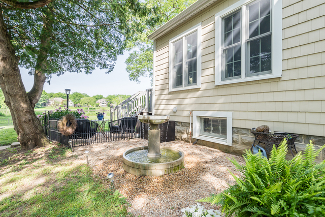 1727 Riverside Avenue St. Charles, IL 60174 - Photo 34 of 50 a view of a house with backyard and sitting area