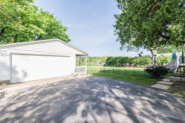 1727 Riverside Avenue St. Charles, IL 60174 - Photo 35 of 50 a view of a house with backyard and a tree