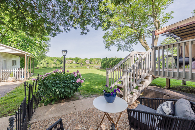 1727 Riverside Avenue St. Charles, IL 60174 - Photo 40 of 50 a view of a house with backyard and sitting area