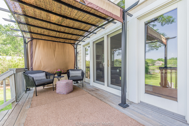 1727 Riverside Avenue St. Charles, IL 60174 - Photo 41 of 50 a view of a patio with couple of chairs and a potted plant