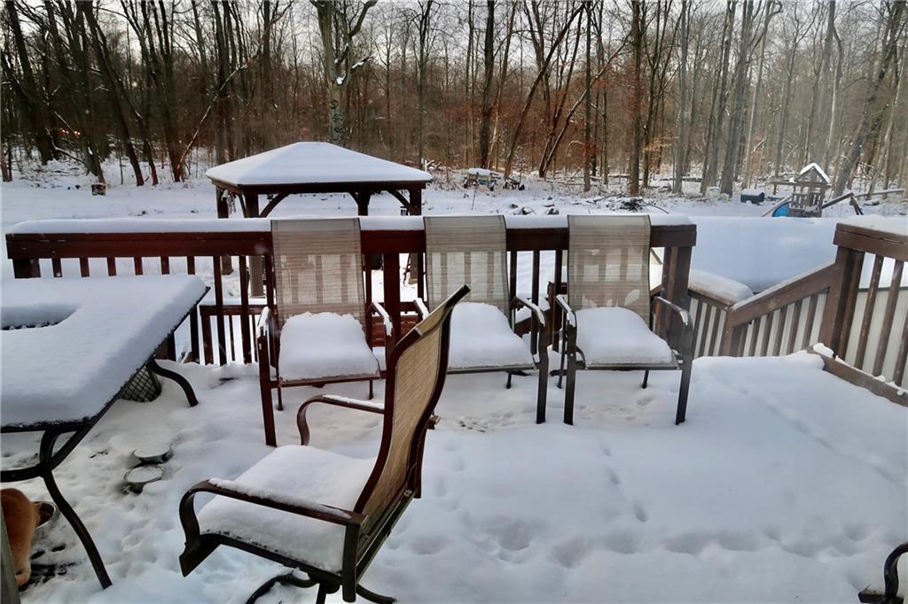 393 Hartwick Road Mercer, PA 16137 - Photo 33 of 50 a view of a chairs and tables in the patio