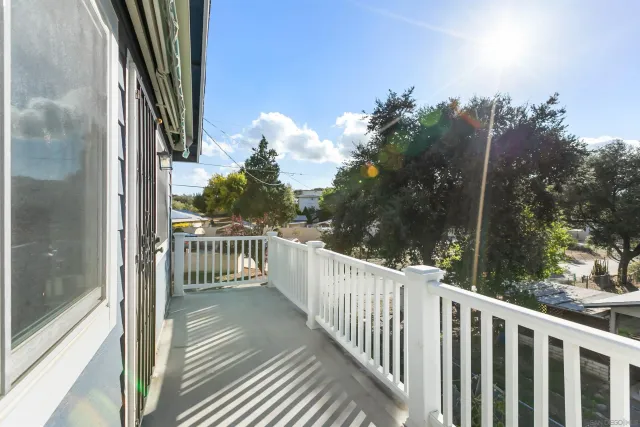 a view of a house with a glass door