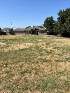 a view of a ocean with a nearby beach