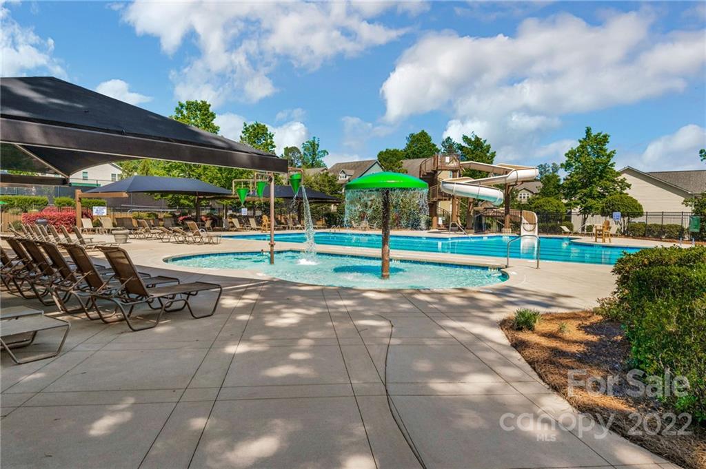 116 Annatto Way Tega Cay, SC 29708 - Photo 29 of 36 a view of a playground with basketball court