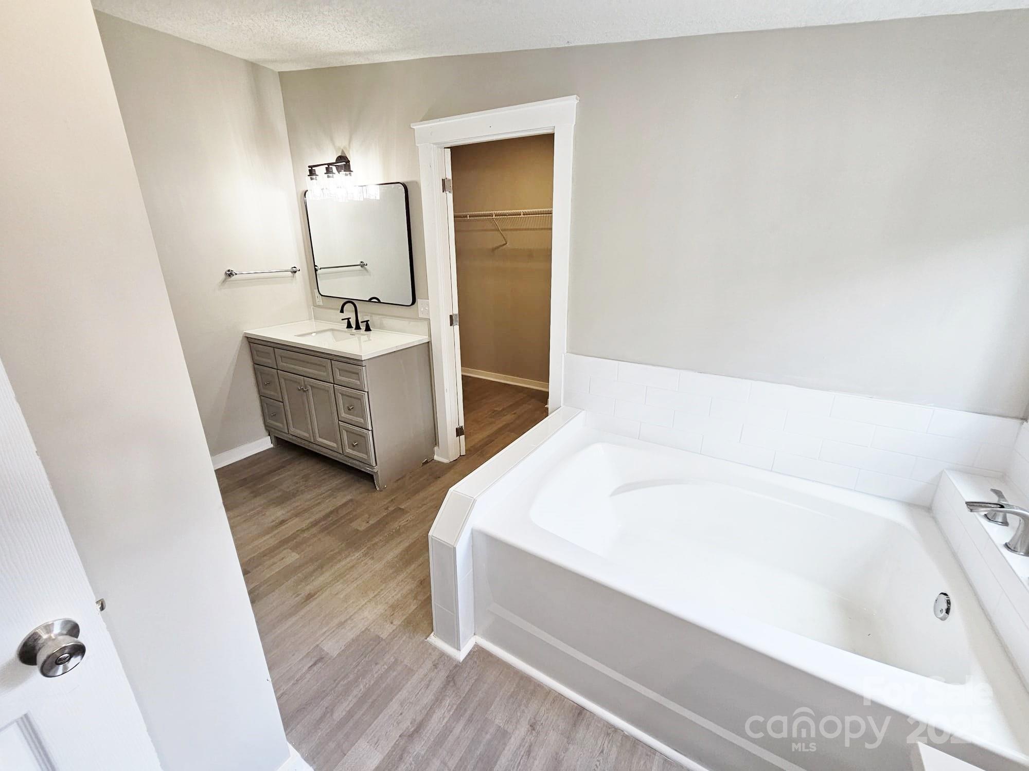 134 Watterson Road Grover, NC 28073 - Photo 8 of 19 a bathroom with a bathtub and a sink