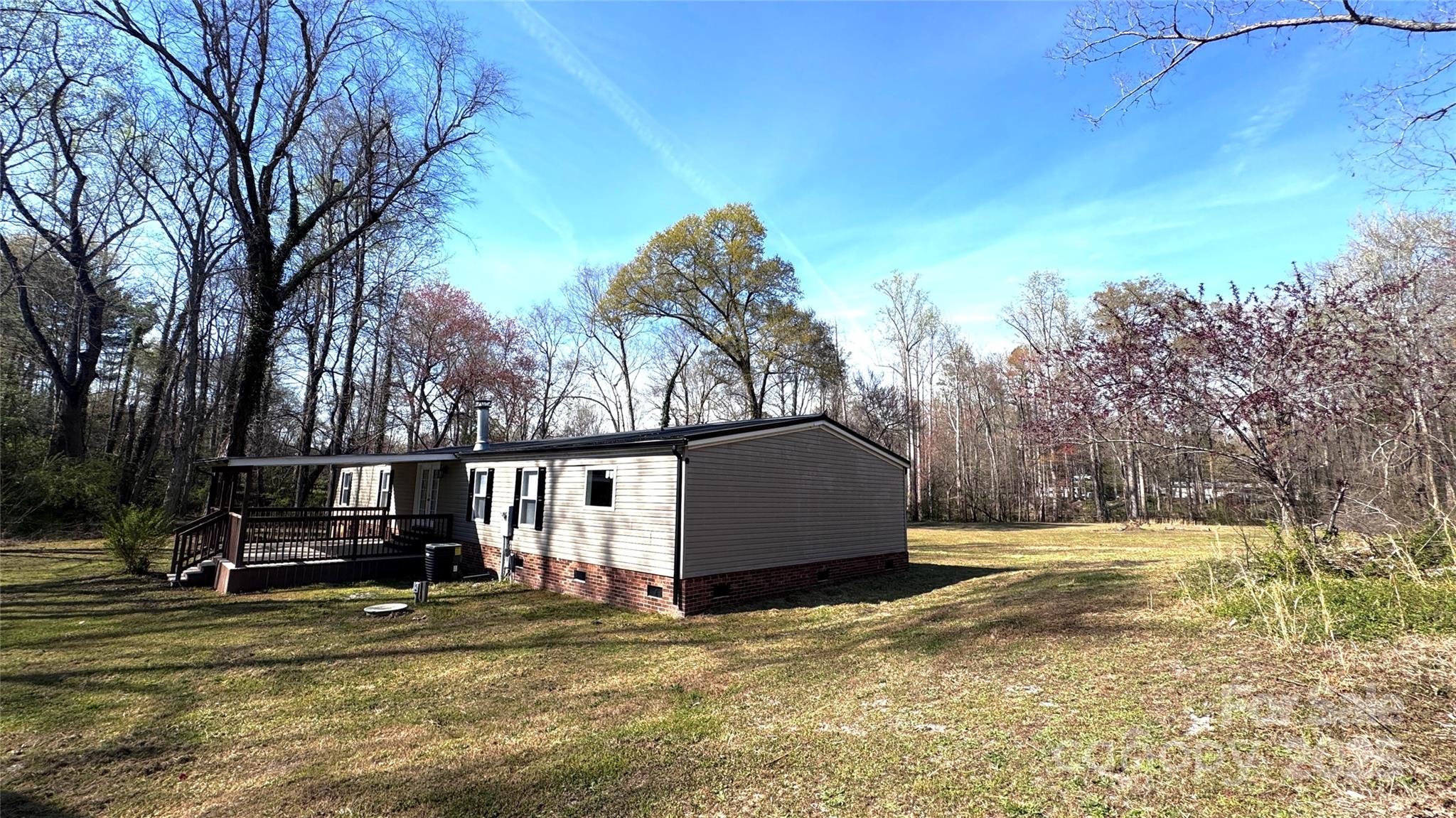 134 Watterson Road Grover, NC 28073 - Photo 10 of 19 a view of swimming pool with outdoor seating and trees