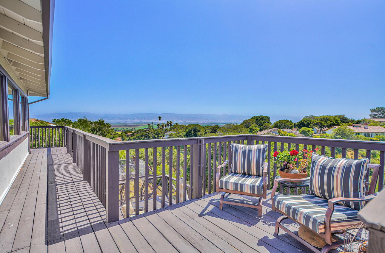 22607 Black Mountain Road Salinas, CA 93908 - Photo 12 of 36 a view of a balcony with wooden chairs