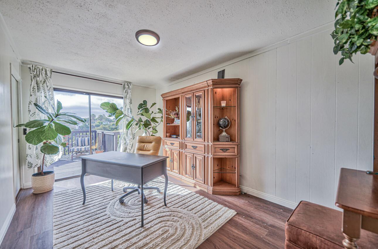 22607 Black Mountain Road Salinas, CA 93908 - Photo 19 of 36 a living room with furniture and a potted plant
