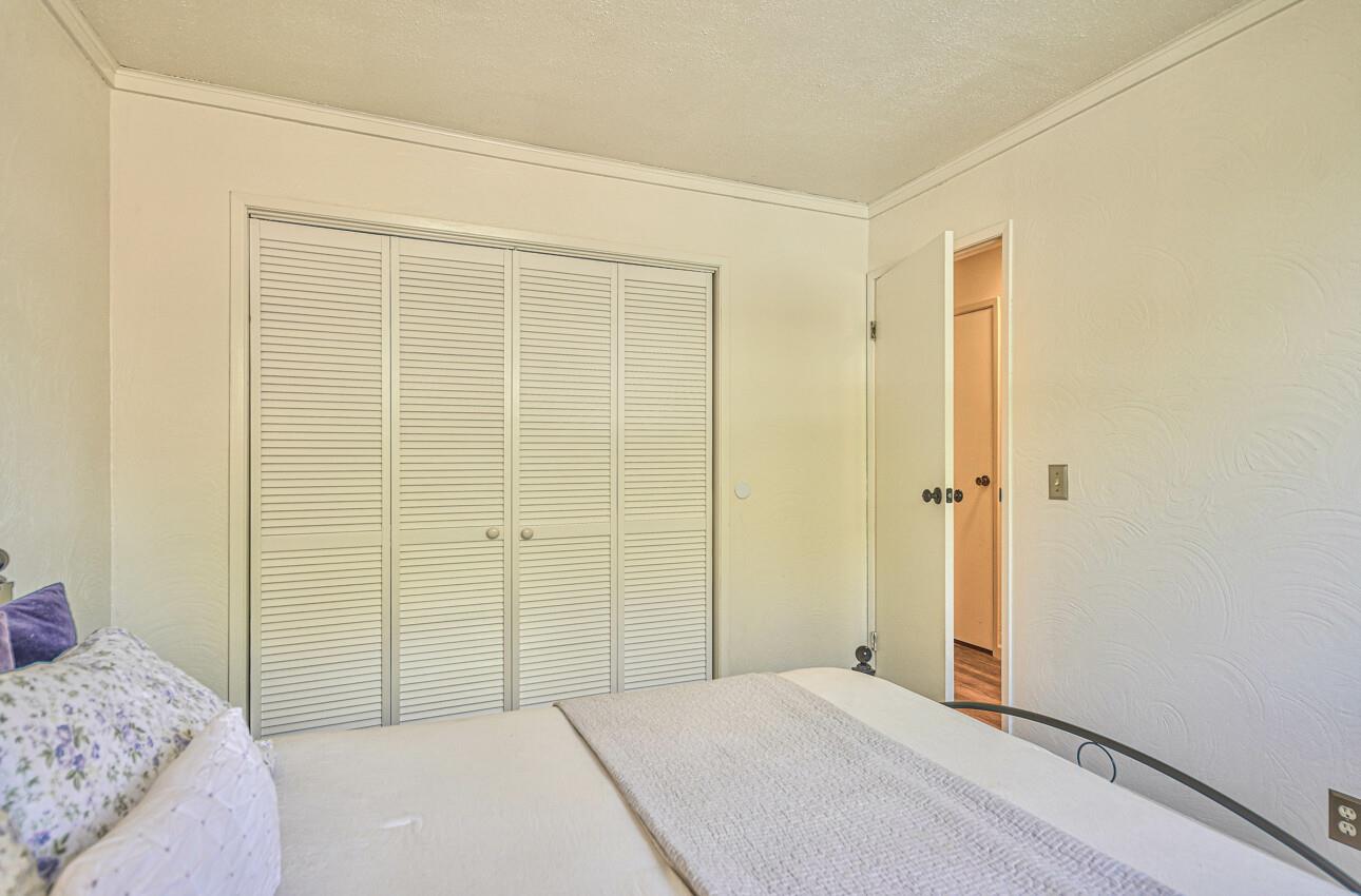 22607 Black Mountain Road Salinas, CA 93908 - Photo 22 of 36 a bedroom with a bed and a shower