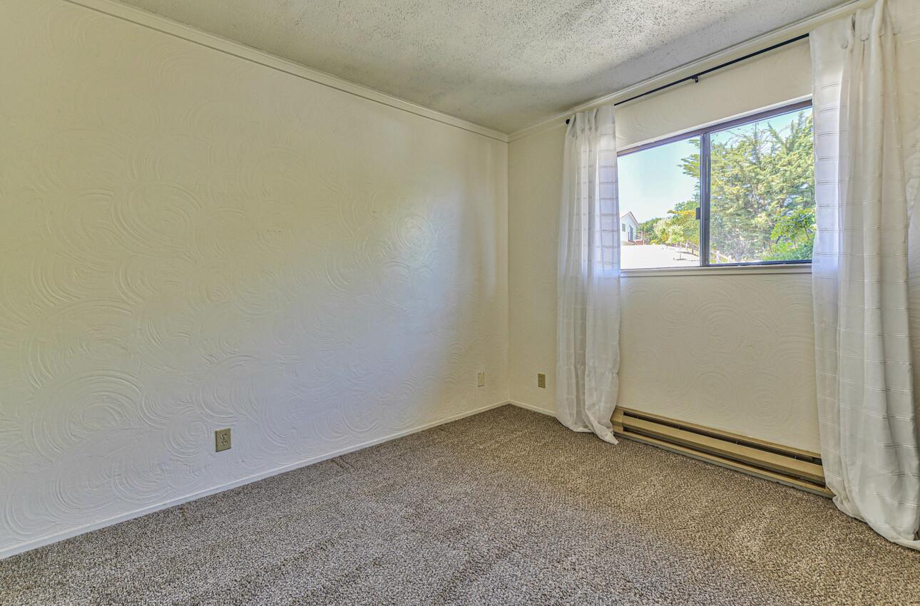 22607 Black Mountain Road Salinas, CA 93908 - Photo 23 of 36 an empty room with a window