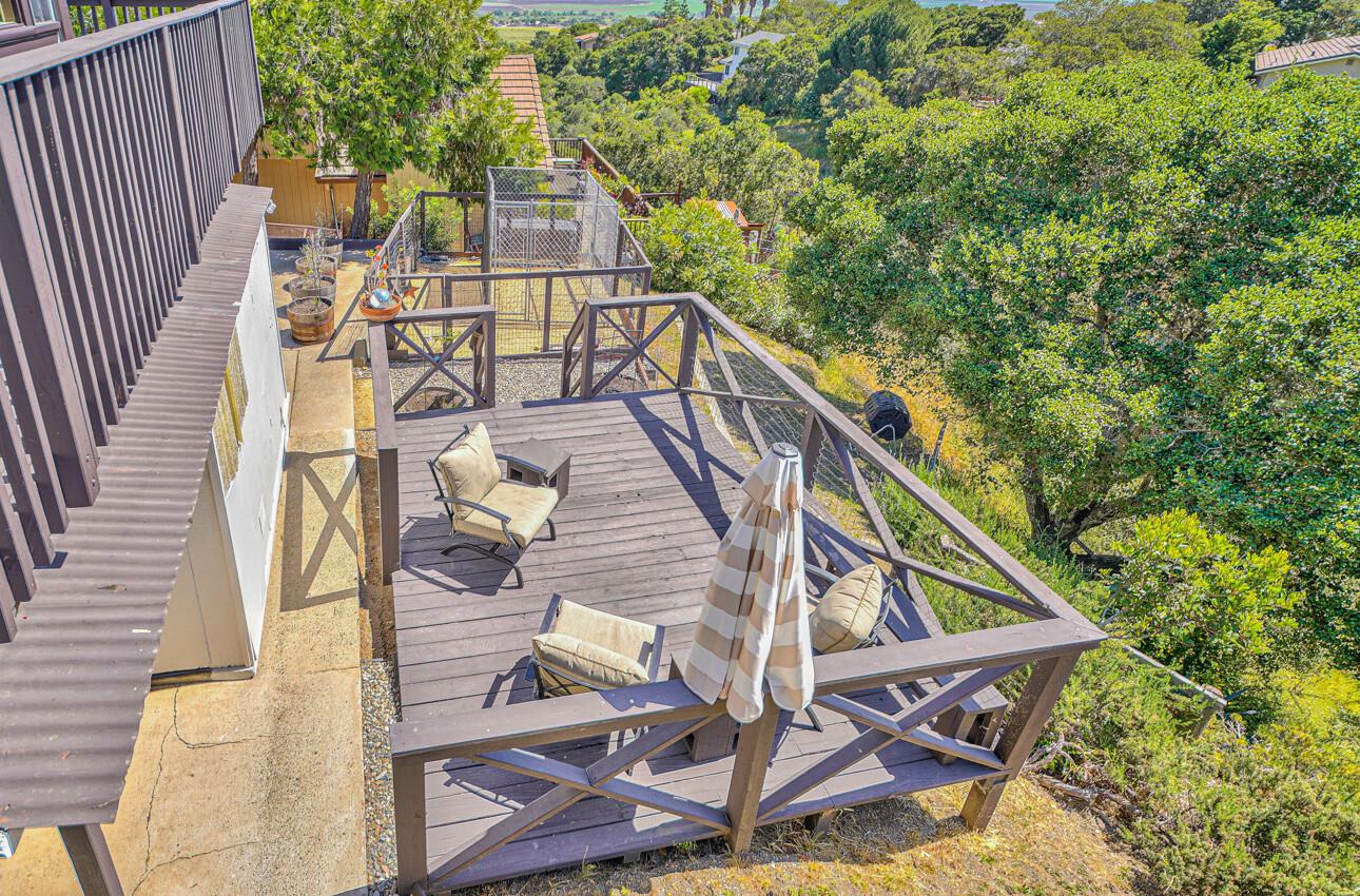 22607 Black Mountain Road Salinas, CA 93908 - Photo 26 of 36 a view of balcony with wooden floor and fence