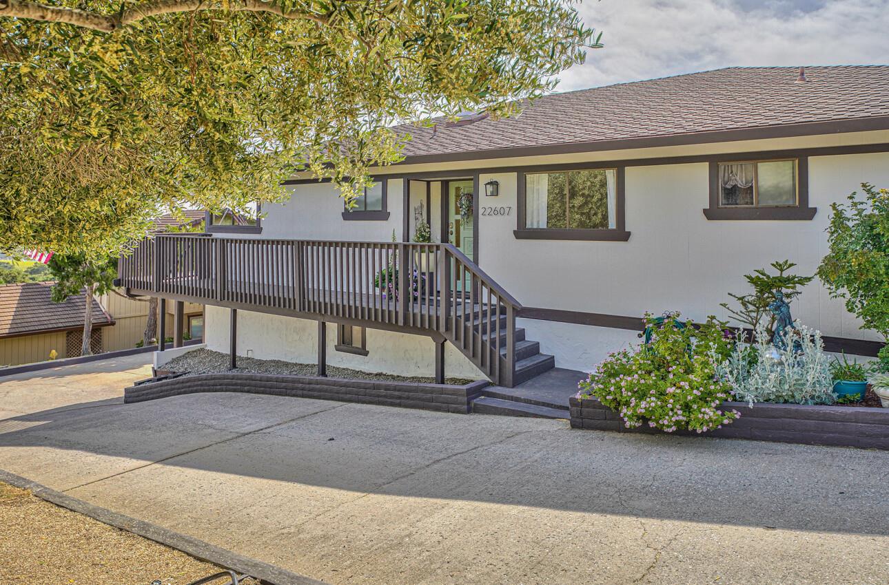 22607 Black Mountain Road Salinas, CA 93908 - Photo 36 of 36 a view of a house with a small yard and wooden fence