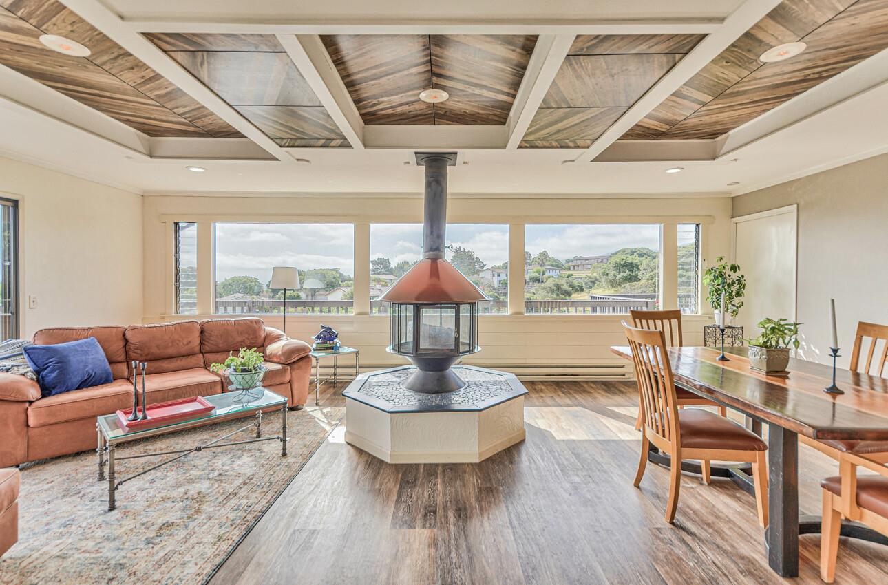 22607 Black Mountain Road Salinas, CA 93908 - Photo 9 of 36 a living room with furniture and a large window