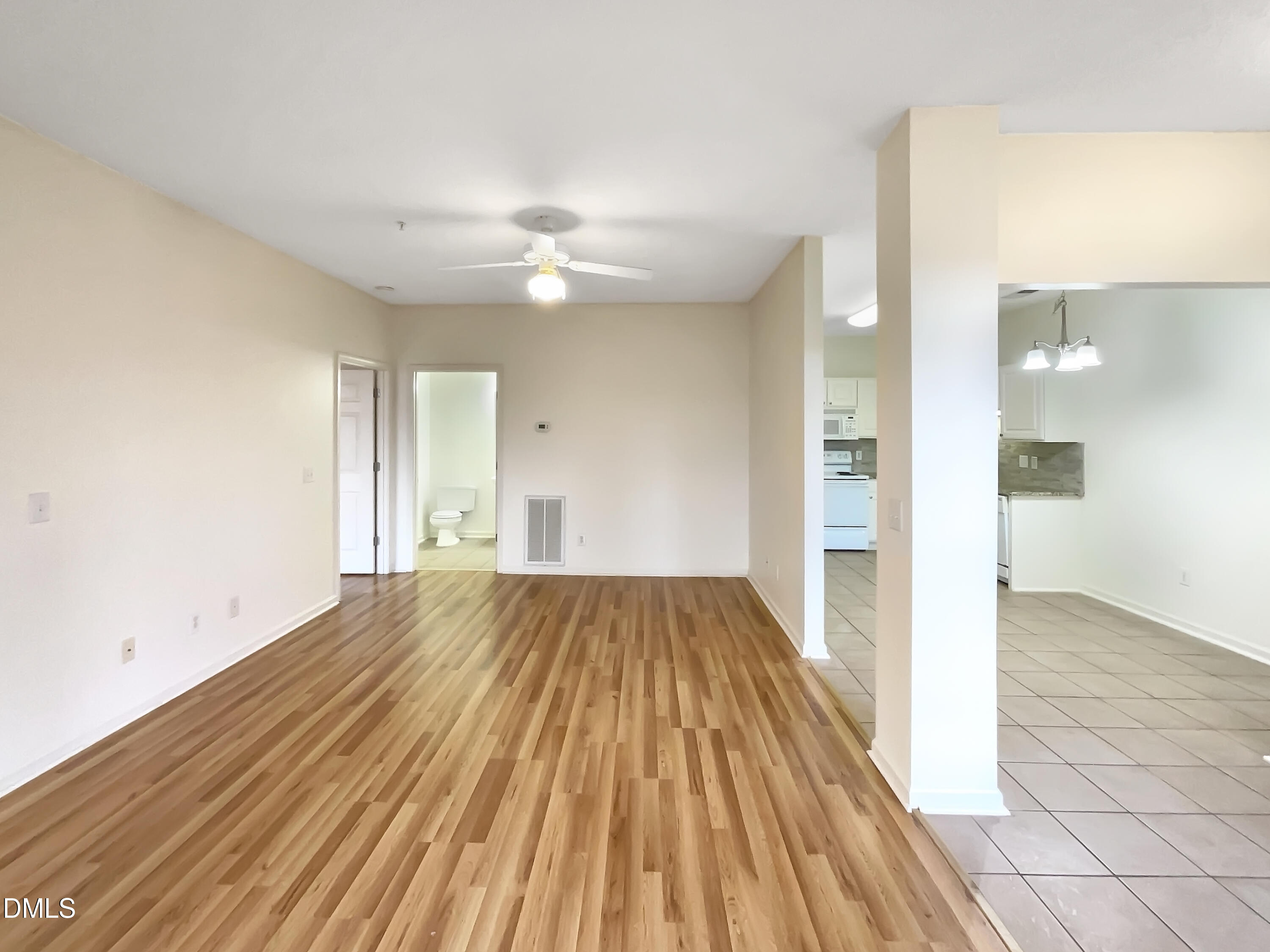2501 Huntscroft Lane, Unit 203 Raleigh, NC 27617 - Photo 8 of 16 a view of a room with wooden floor