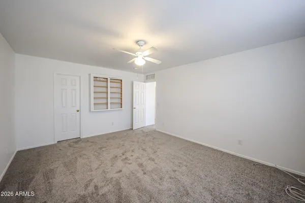 a view of a room with racks on the wall