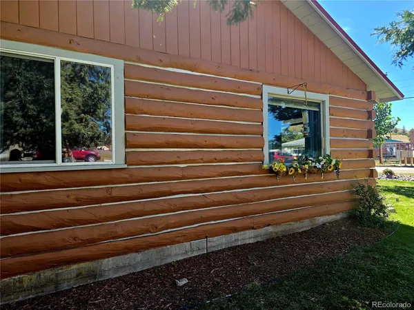 a front view of a house with a porch