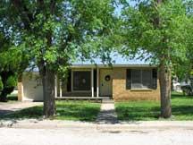 301 Southwest 44th Avenue Amarillo, TX 79110 - Photo 1 of 1 front view of a house with a yard