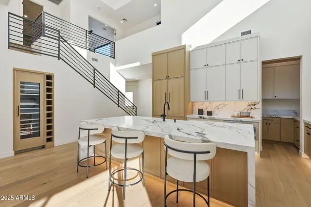 a bathroom with a white bath tub and a shower