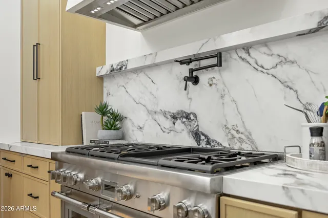 a view of a living room and entryway