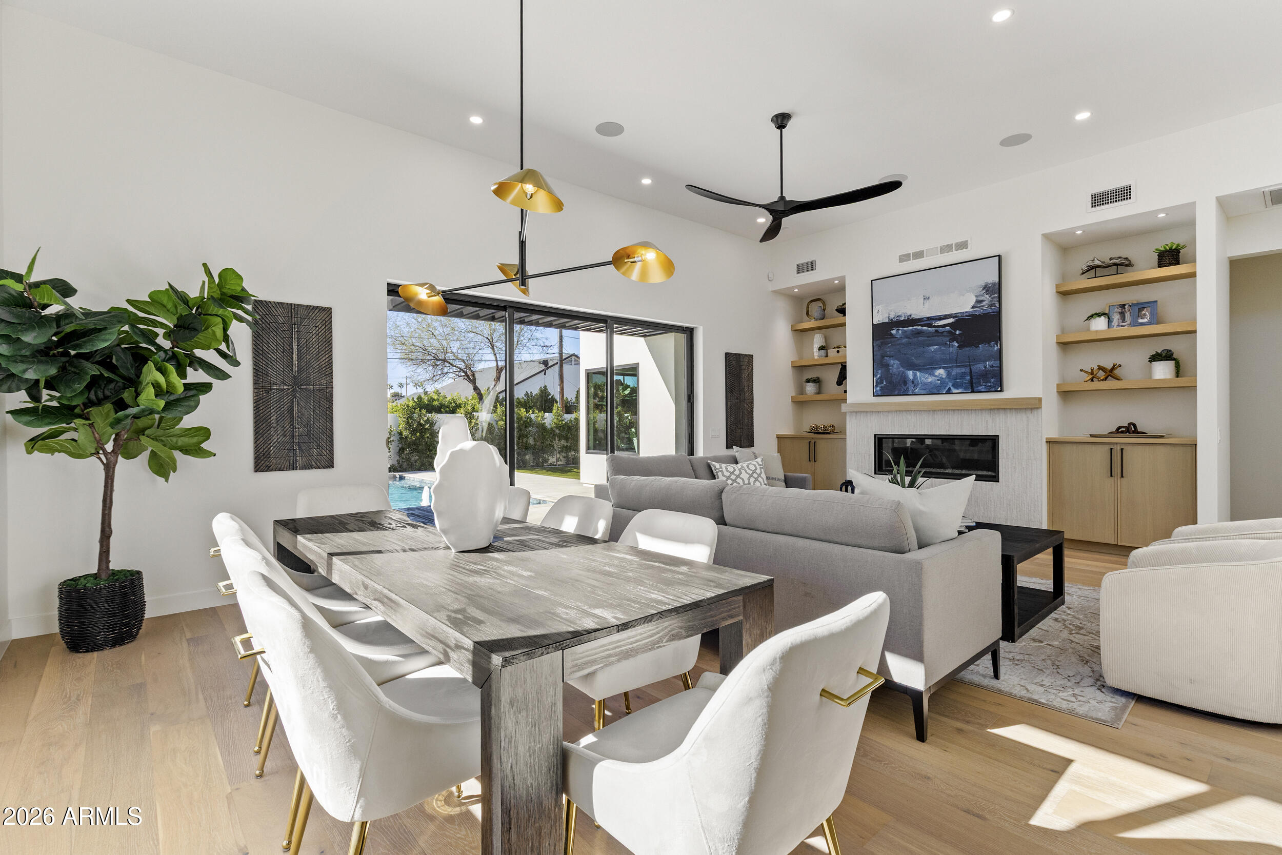 4234 North 42nd Place Phoenix, AZ 85018 - Photo 23 of 78 a living room with fireplace furniture and a large window