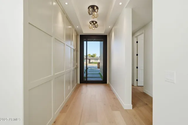 a kitchen with a stove and a white cabinet