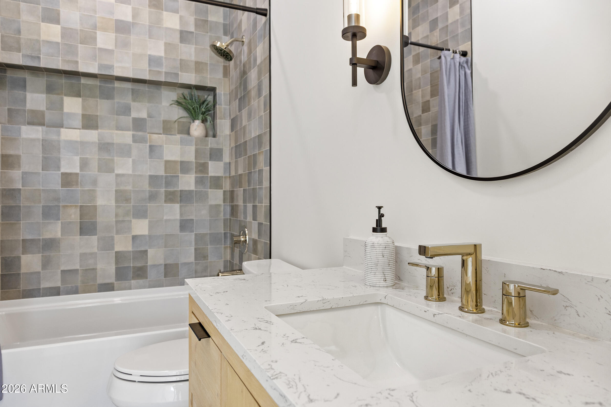 4234 North 42nd Place Phoenix, AZ 85018 - Photo 58 of 78 a bathroom with a granite countertop sink and a mirror