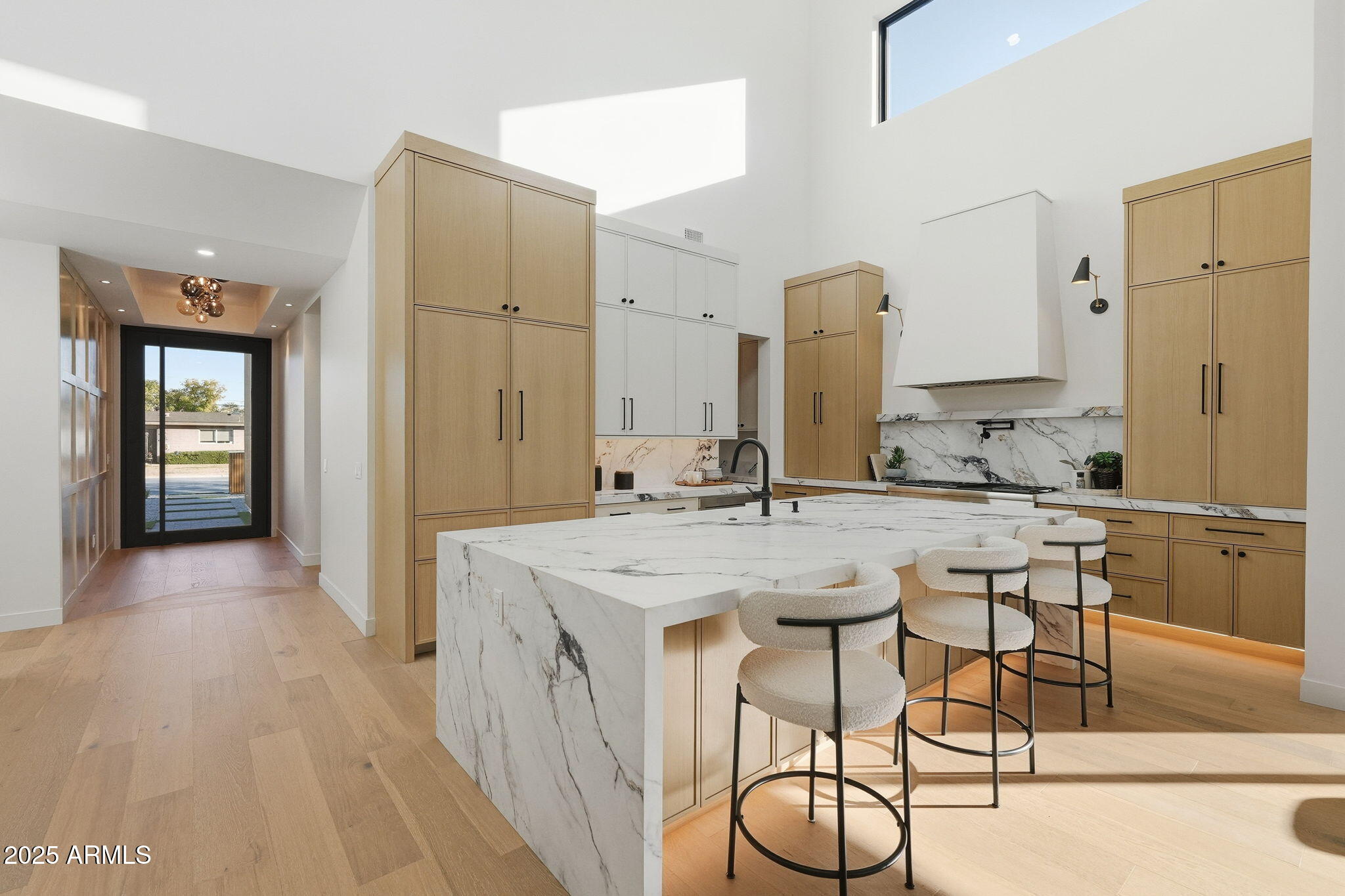 4234 North 42nd Place Phoenix, AZ 85018 - Photo 7 of 78 a kitchen with stainless steel appliances granite countertop a sink and a refrigerator