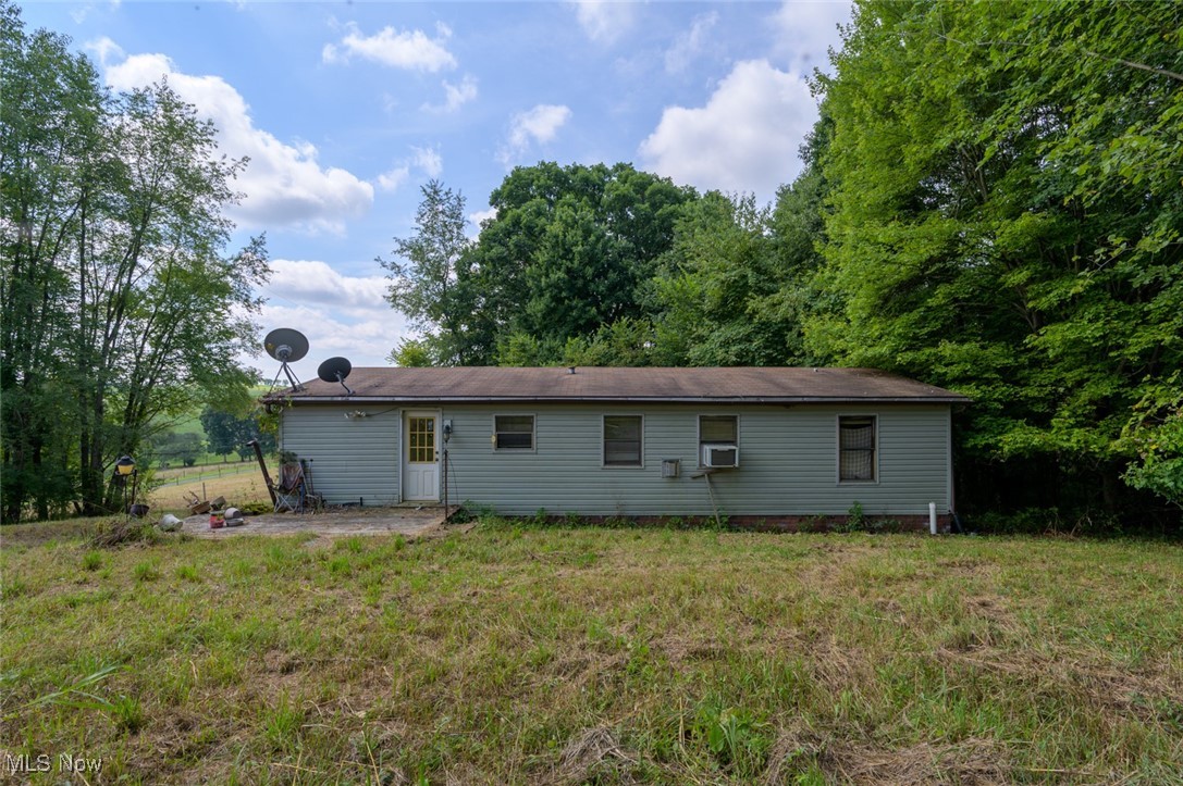 50218 Smith Road Negley, OH 44441 - Photo 4 of 21 Back of property featuring a yard