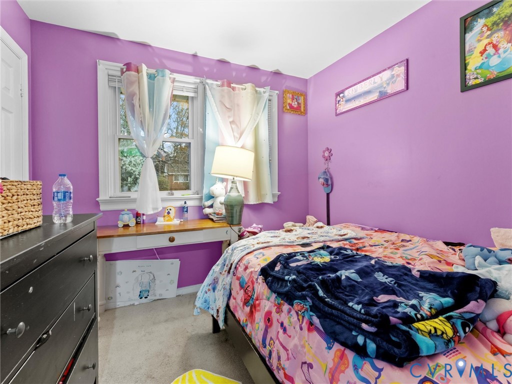 2942 Gaffney Road Richmond, VA 23237 - Photo 11 of 18 a bedroom with a bed and a dresser