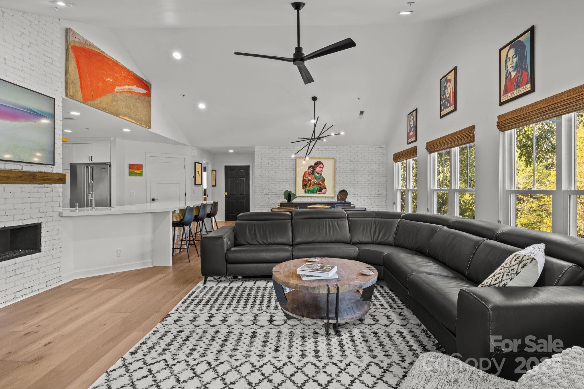 950 Jetton Street, Unit 3 Davidson, NC 28036 - Photo 20 of 29 a living room with furniture