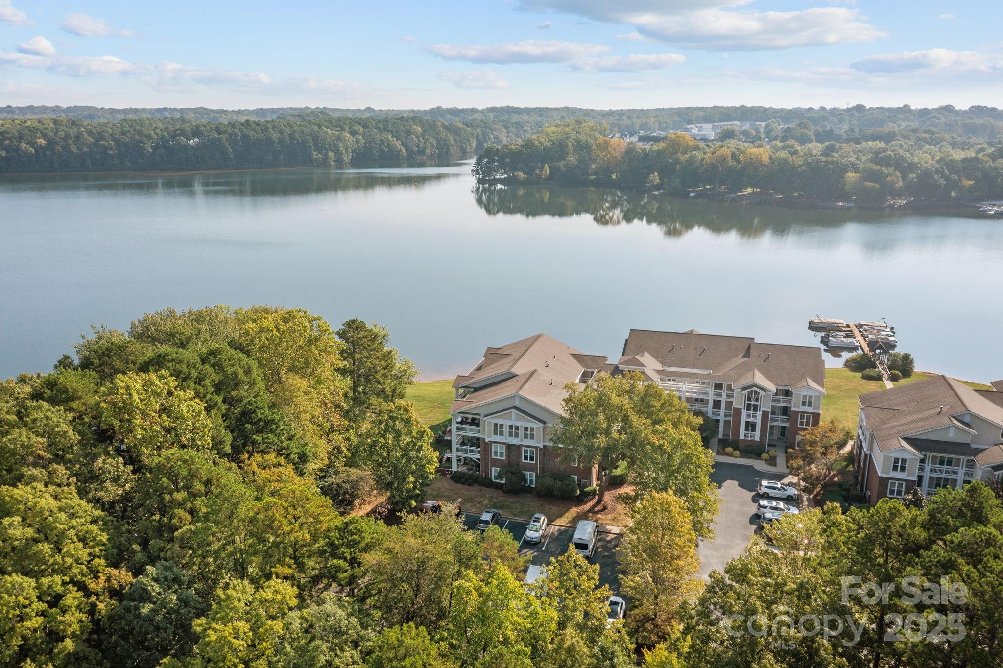 950 Jetton Street, Unit 3 Davidson, NC 28036 - Photo 28 of 29 an aerial view of a house with lake view