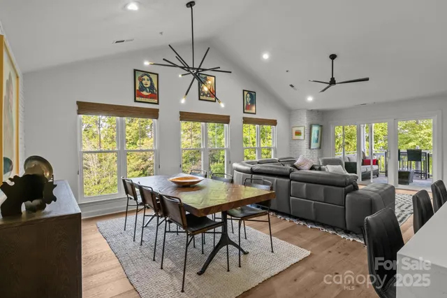 a view of a dining room with furniture window and outside view
