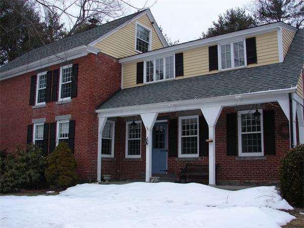 53 Wilder Road Sterling, MA 01564 - Photo 1 of 23 a front view of a house with a yard in front of it