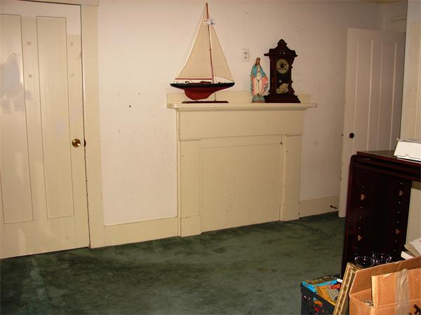 53 Wilder Road Sterling, MA 01564 - Photo 15 of 23 a view of a storage and utility room with a door