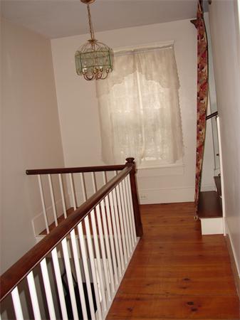 53 Wilder Road Sterling, MA 01564 - Photo 17 of 23 a view of a hallway view with wooden floor and staircase