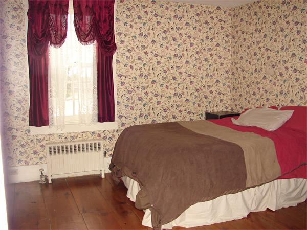 53 Wilder Road Sterling, MA 01564 - Photo 8 of 23 a bedroom with a bed and a window