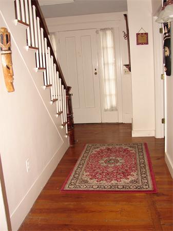 53 Wilder Road Sterling, MA 01564 - Photo 10 of 23 a view of entryway with wooden floor and rug