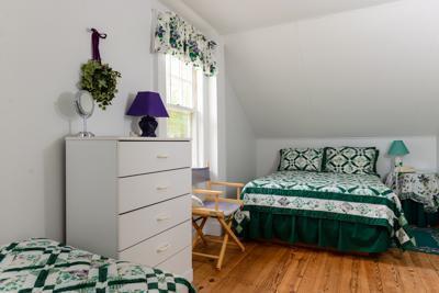 79 Old Farm Road Centerville, MA 02632 - Photo 13 of 17 a bed sitting in a bedroom next to a window