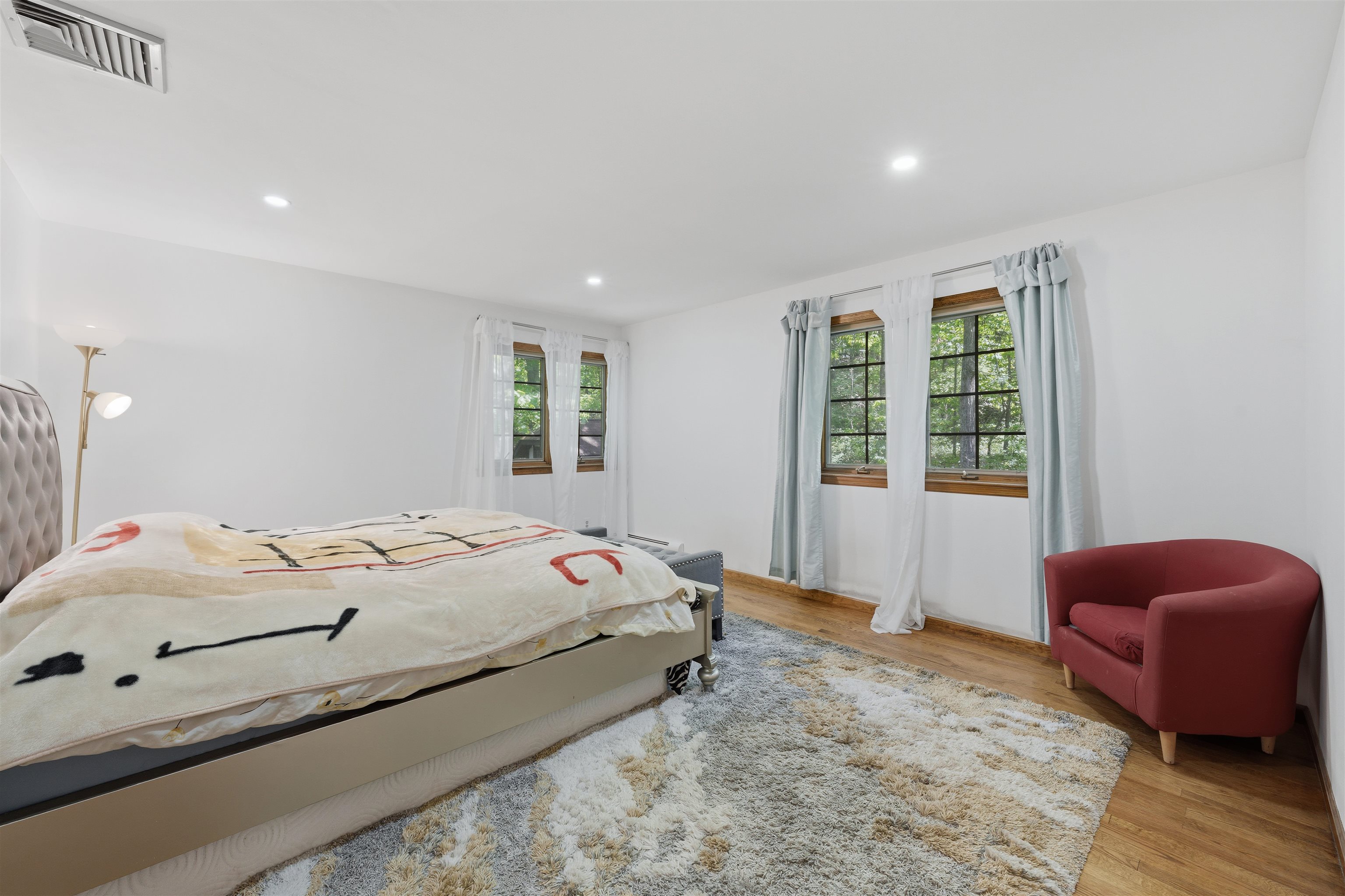 2 Carol Road Butler, NJ 07405 - Photo 24 of 49 a bedroom with a bed and wooden floor