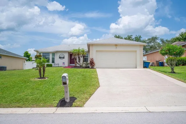 a front view of house with yard